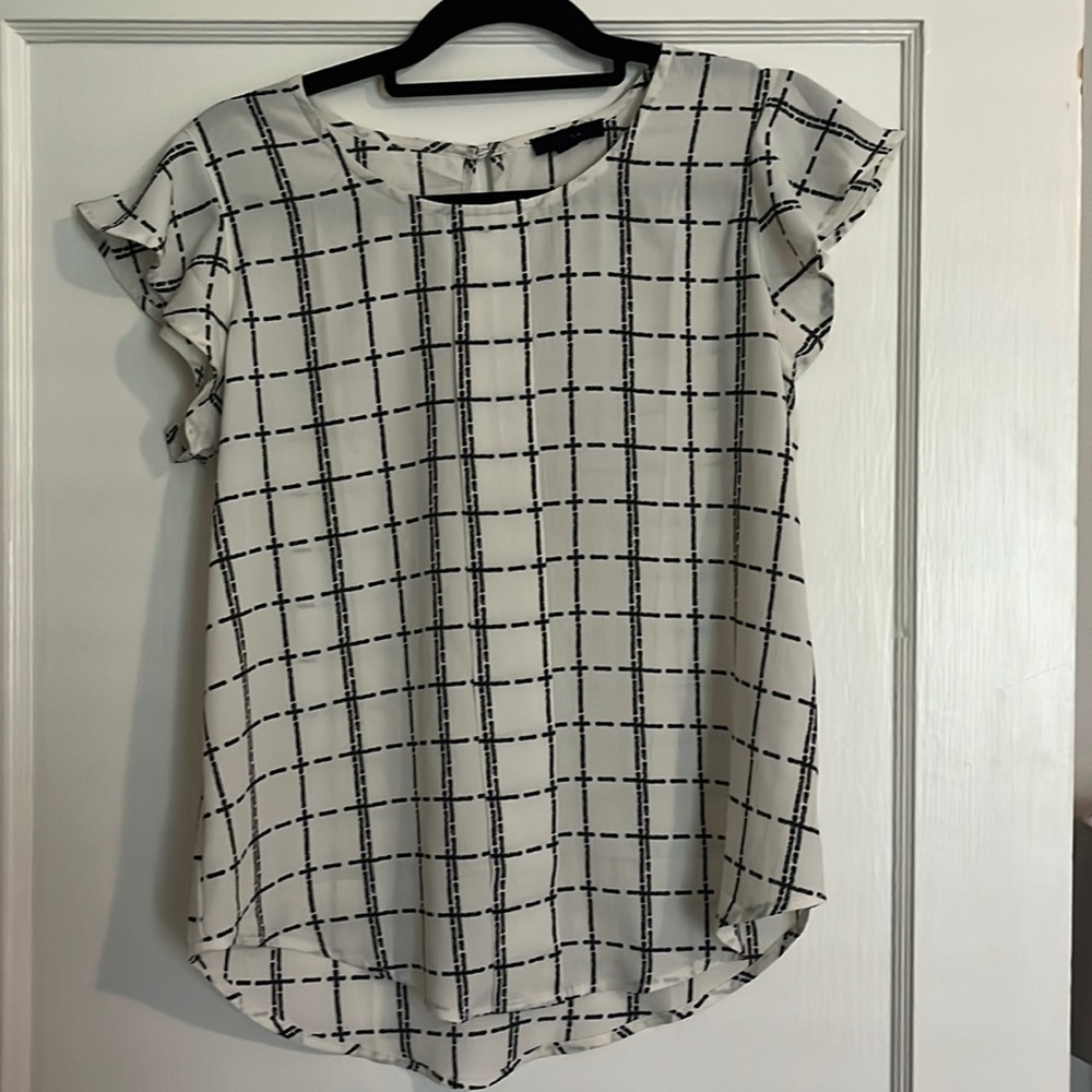 Black and white ruffle sleeved top. Size S